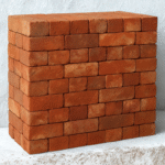 Bricks B Grade (Doam) standard quality clay bricks, economical construction material for walls, foundations, and general building works in Pakistan.