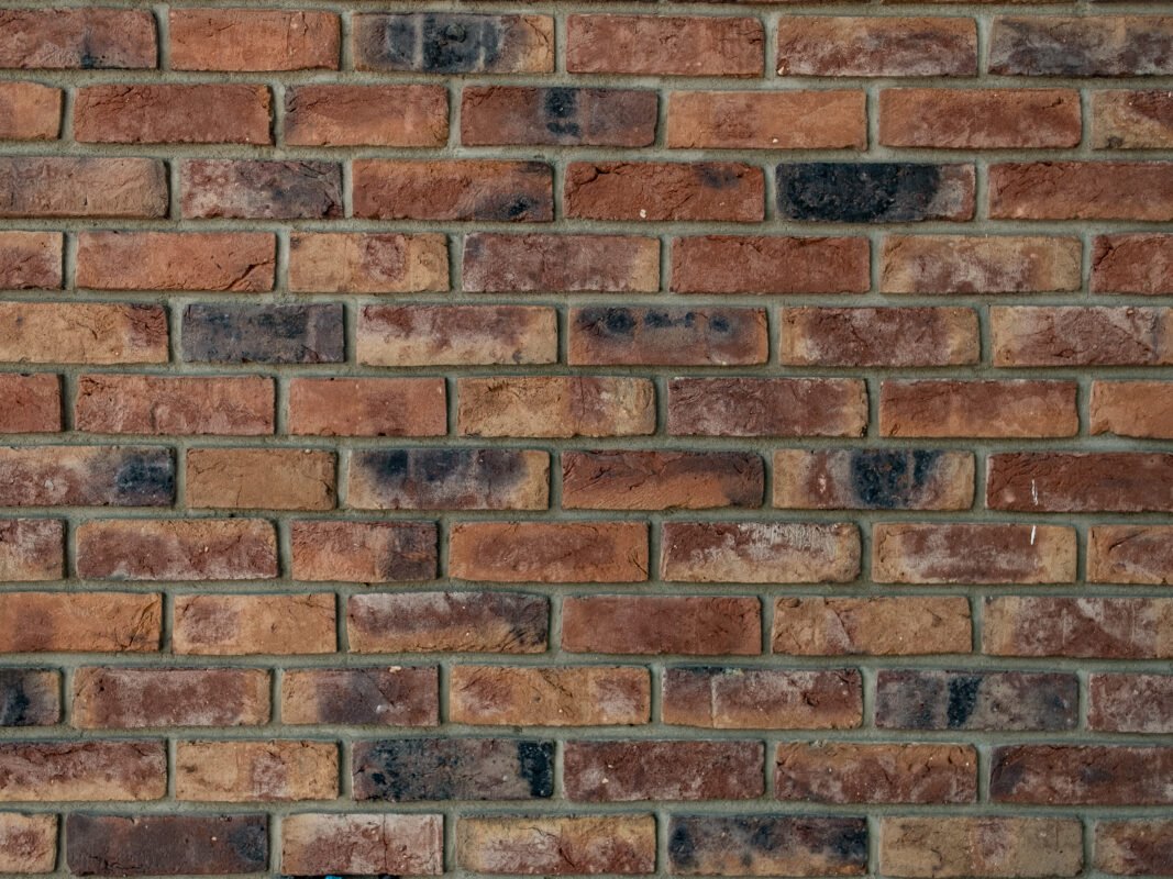 Burn Bricks (Khingar) low-grade clay bricks, economical construction material for boundary walls, temporary structures, and non-load-bearing works in Pakistan.