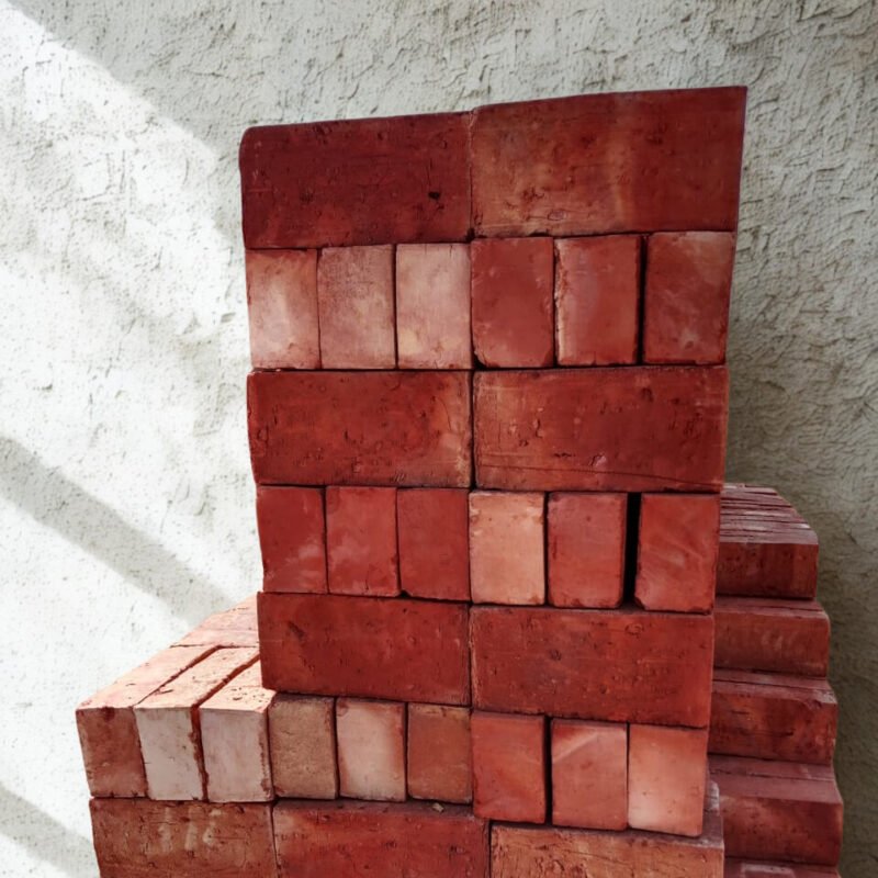 Special export quality machine bricks premium red clay bricks on white background